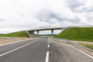 Fototapeta premium A new recently built highway in Brcko district, Bosnia and Herzegovina. The road was built by Spanish company Rubau and is important for the region