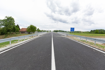 A new recently built highway in Brcko district, Bosnia and Herzegovina. The road was built by Spanish company Rubau and is important for the region