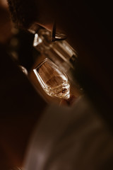 Glass of rose and white wine seen in close hand.