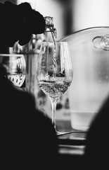 Glass of rose and white wine seen in close hand.