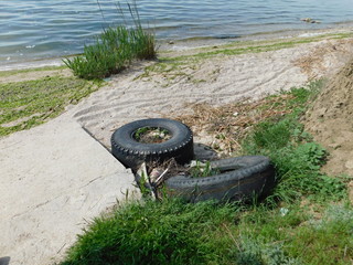  environmental problems, litter on the river bank, environmental hazards