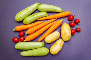 Fresh vegetables cooking black stone background