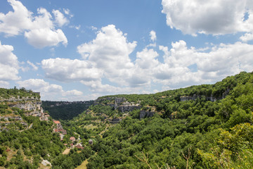 Fototapeta premium Beautiful view on a France medieval village in mountains. Romantic countryside in the heart of France.