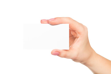 Empty sheet of paper in female hand with manicure isolated on white