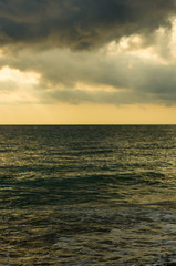 Amazing sea sunset, the sun, waves, clouds