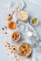 Homemade granola muesli with ingredients, healthy food for breakfast