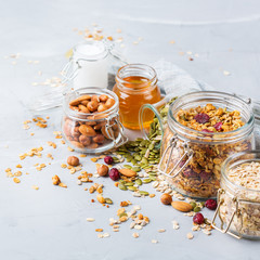 Homemade granola muesli with ingredients, healthy food for breakfast