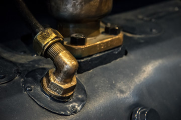 part of a steam engine, brass valve, angular  tube