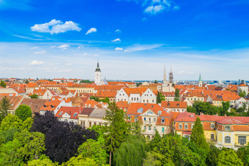 Obraz premium Panoramic view on Upper town and st Mark church tower in Zagreb, Croatia, red roofs of old baroque center