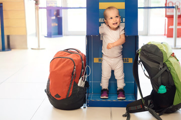 Family with baby in travel together and waiting for departure