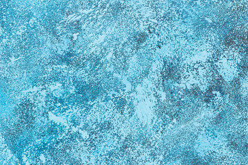 Fototapeta na wymiar Abstract blue paint on a surface, texture art background