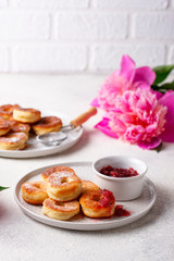 Homemade donuts with rose jam