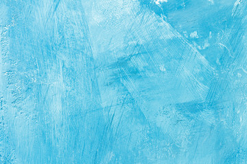 Abstract blue paint on a surface, texture art background