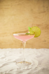 Cold fresh cocktail by beach