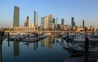 Fototapeta na wymiar Skyline of Kuwaiti city with marina in foreground