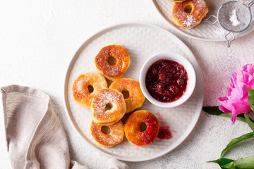 Homemade donuts with rose jam