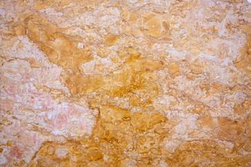 very beautiful texture of natural red marble with lots of inclusions of different colors. Abstract pattern.