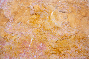 very beautiful texture of natural red marble with lots of inclusions of different colors. Abstract pattern.