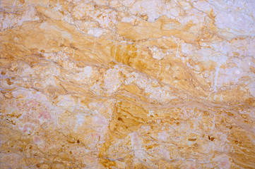 very beautiful texture of natural red marble with lots of inclusions of different colors. Abstract pattern.