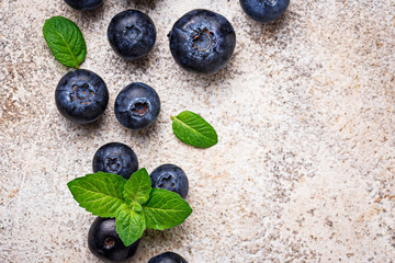 Fresh blueberries on light background