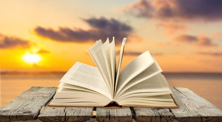 Stack books collection on library background