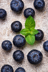 Fresh blueberries on light background