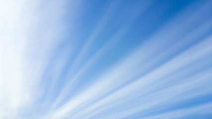 Straight line clouds as sun rays