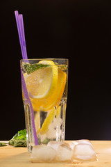 Cold lemonade in a glass cup