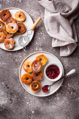 Homemade donuts with rose jam