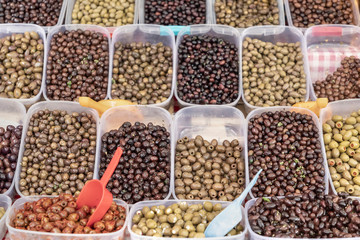 Kotor, Montenegro - Variety of green, red and black olives for sale at the local green market stand