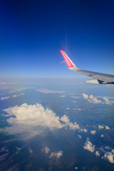 Fototapeta na wymiar View from airplane with wing