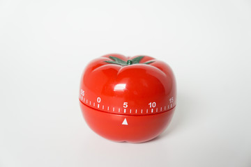 Close up view of mechanical tomato shaped kitchen clock timer for cooking & studying. Used for...