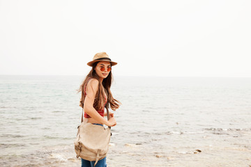 Fototapeta premium Traveler young woman portrait in outdoors