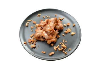 fried fermenting pork bone with crispy garlic on plate