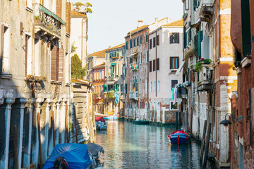 Fototapeta na wymiar VENICE, ITALY - December 21, 2017 : View of water street and old buildings in Venice, ITALY