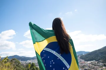 Foto auf Acrylglas Brasilien Woman with brazilian flag, independence day
