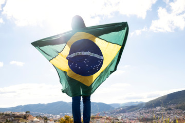 Woman with brazilian flag, independence day