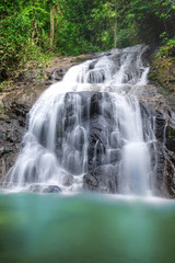 Fototapeta na wymiar beautiful waterfall Ton Chong Fa in the forest in Khao Lak province, Thailand, national Park.
