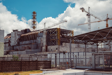 Chernobyl Nuclear Power Plant after atomic reactor explosion. Destroyed abandoned station and ghost...