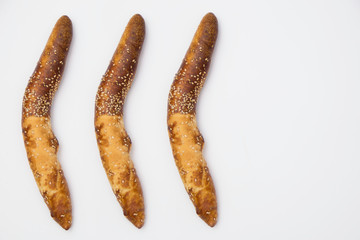 Three Traditional Balkan baguettes on white background.