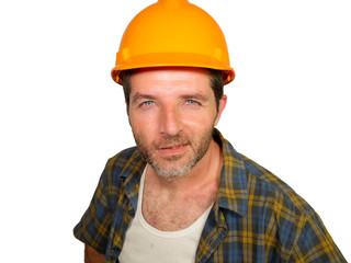 corporate portrait of construction worker - Handsome and confident builder man in safety helmet smiling happy posing relaxed as successful contractor or handyman
