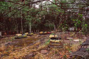 Destroyed abandoned ghost city Pripyat ruins after Chernobyl disaster. Old broken rusty metal...