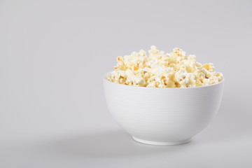 Popcorn bowl isolated on white, clipping path included.