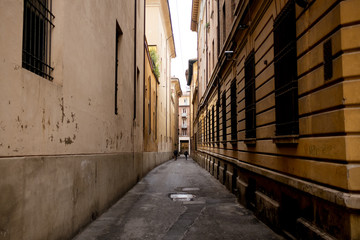 day view of Bologna city classic alleys known as "portici" characteristic of italian town architecture in the historic center