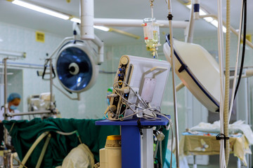 Surgeons team working of patient in surgical operating room