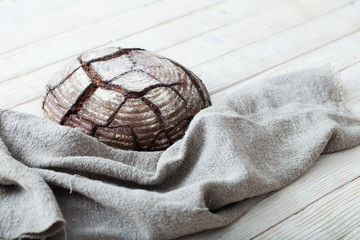  homemade bread on  white wooden background