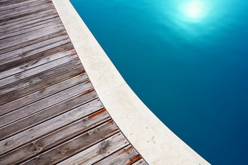 Swimming pool and wooden flooring