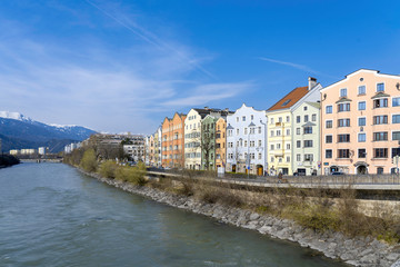 Obraz premium Innsbruck, Tyrol, Austria. Colored houses on the Inn River in Innsbruck. Colored houses in Innsbruck.