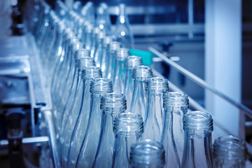 Closeup of a lot of glass bottles