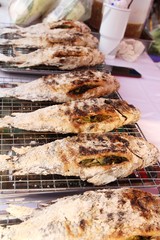 Grilled fish on stove at street food